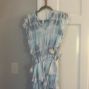 Blue and white tie-dye dress with pom poms